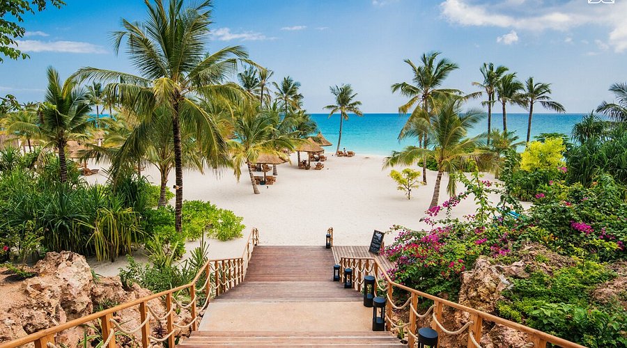 White sandy beach and turquoise ocean in Zanzibar